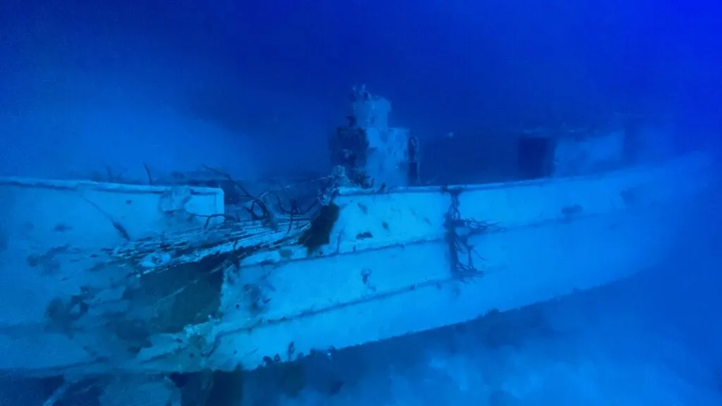 Technical divers gearing up for a guided deep dive